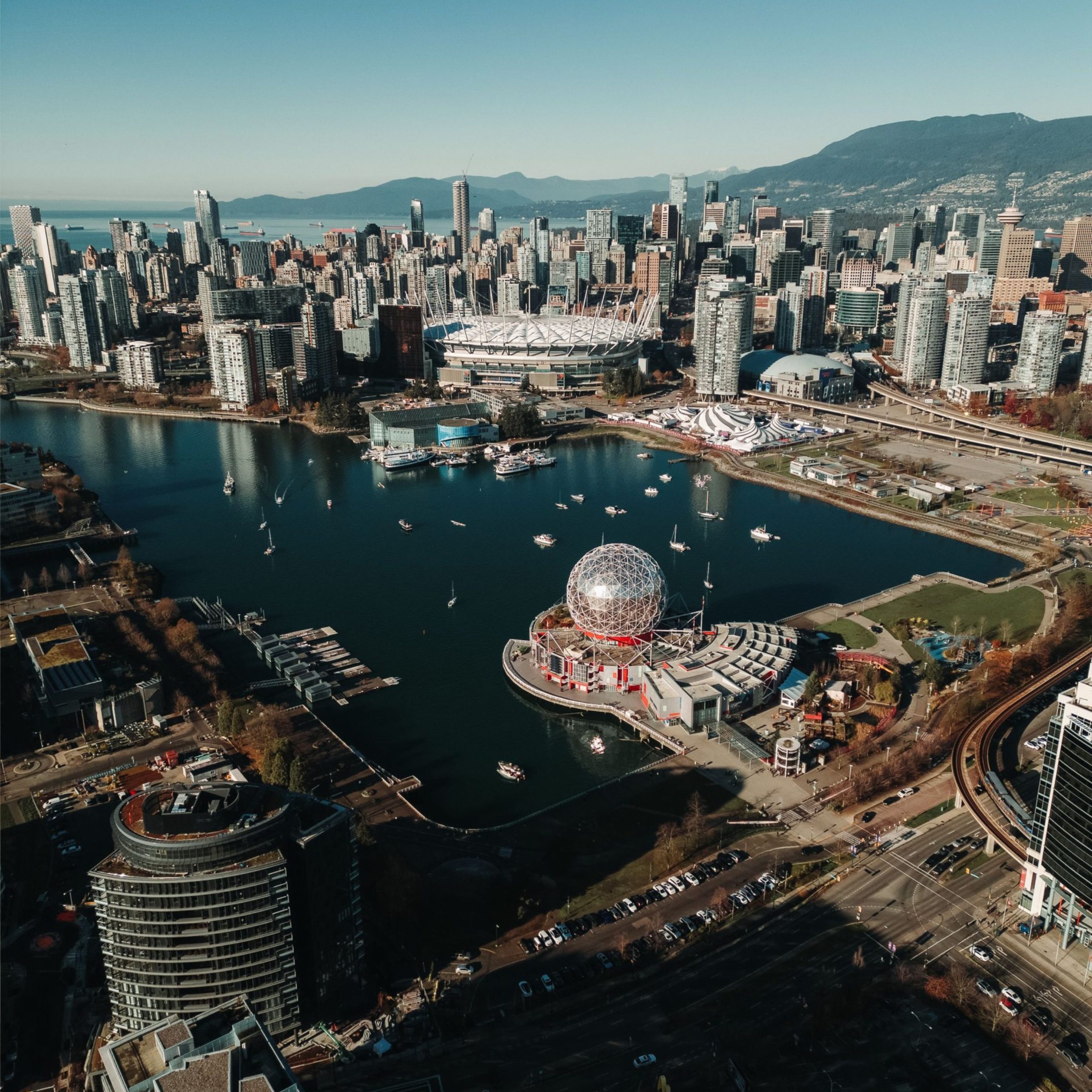 Vancouver skyline over False Creek with Science World, BC Place and the North Shore mountains
